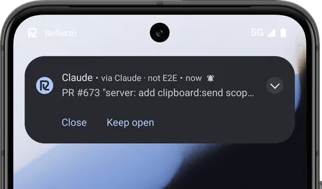 An Android phone showing a question sent by Claude, with Close and Keep open buttons
